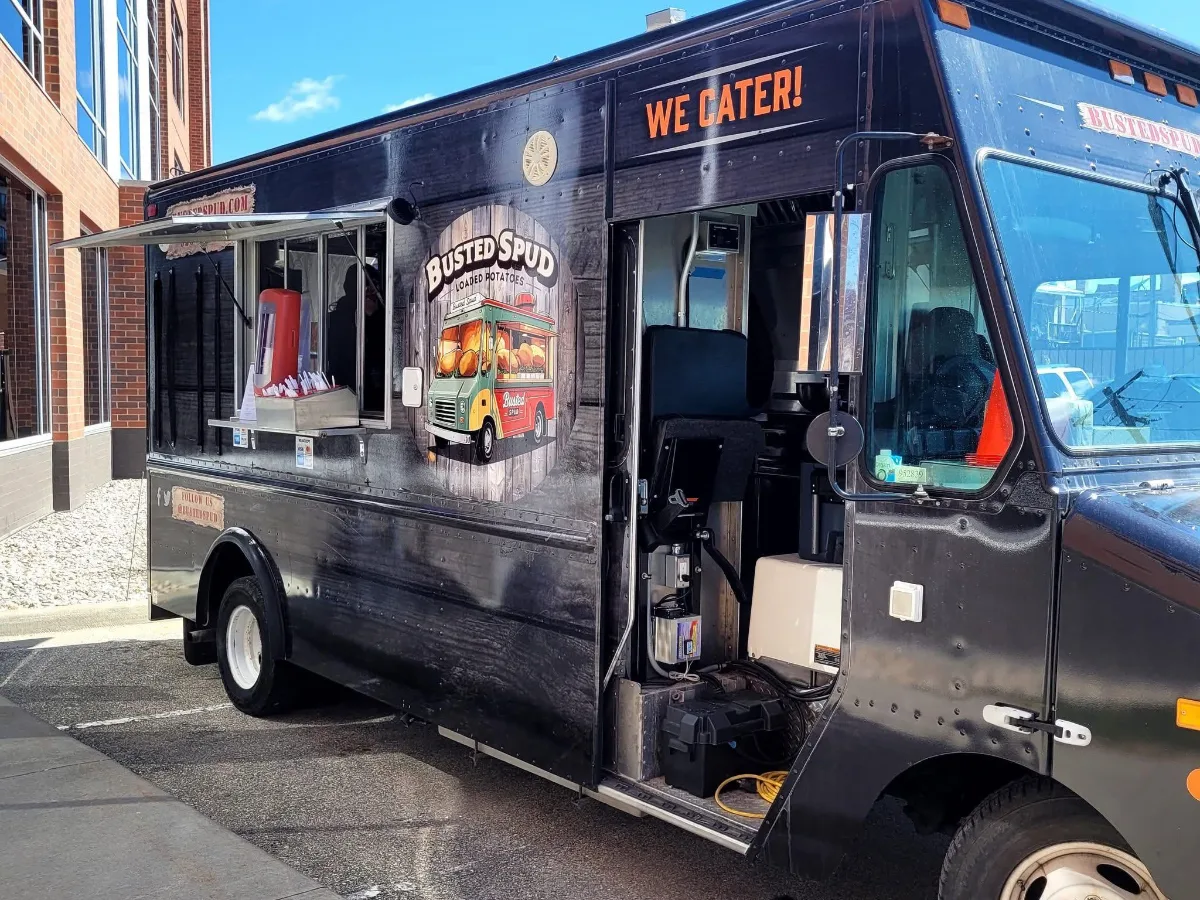The Busted Spud food truck serving guests at a catered event in the Fox Valley, Wisconsin